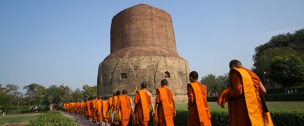 Buddhist,Monks,Walking,Candlelit,Or,Publish,Dharma,At,Dhamek,Stupa